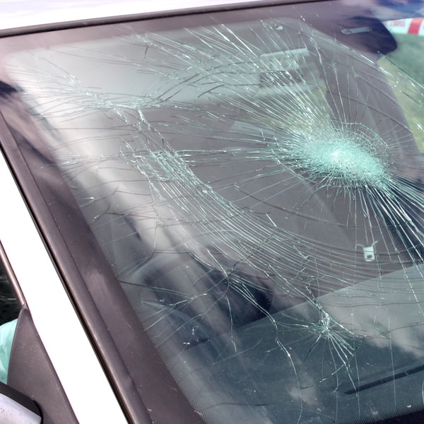 which auto glass replacement service to call and what does it cost to fix broken windshield 